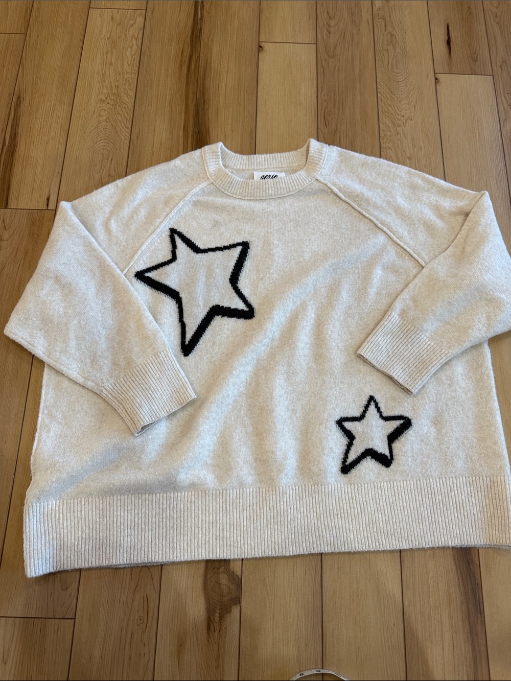 aerie Cream Crewneck Sweater with Black Star Motifs